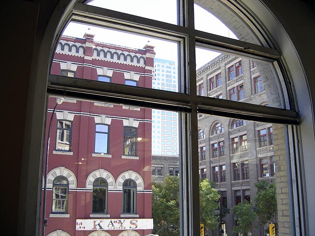 View of Exchange District through arched window
